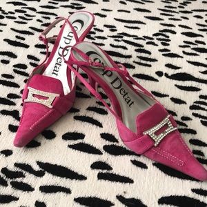Pink suede pumps